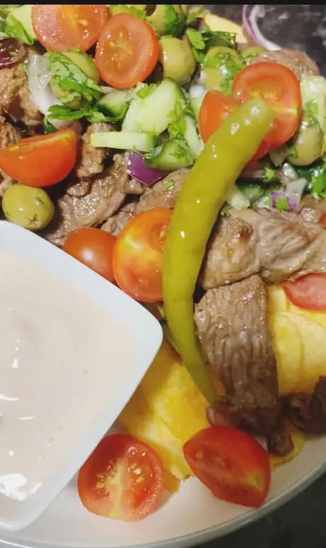 Loaded beef crunch plate served with sauce