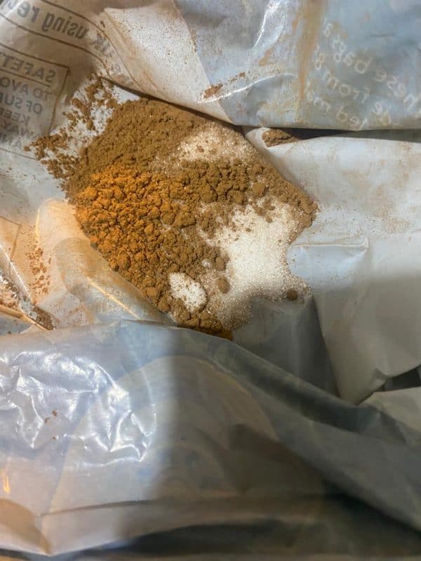 Cinnamon and sugar mixture ready for coating fried bites.