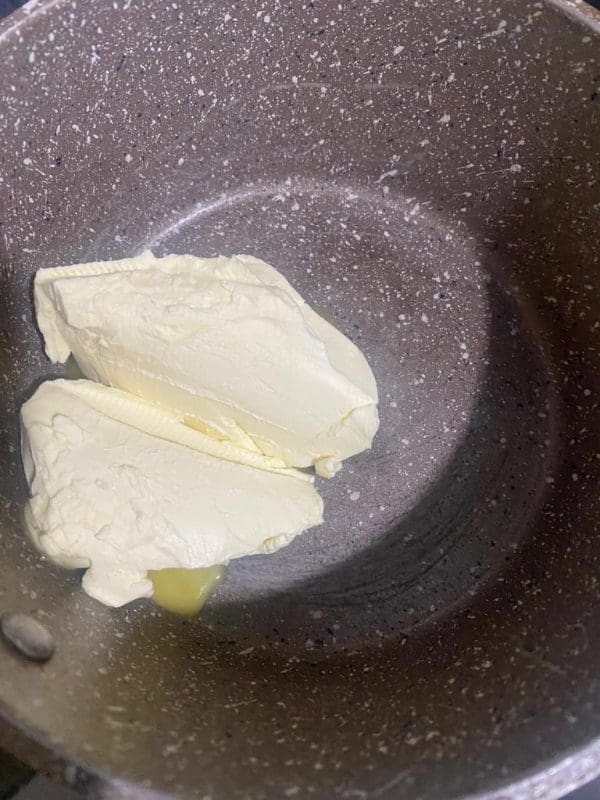 Butter melting in a saucepan.