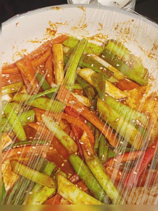 Tossed vegetable medley coated with sesame seeds, spices, and dressing.