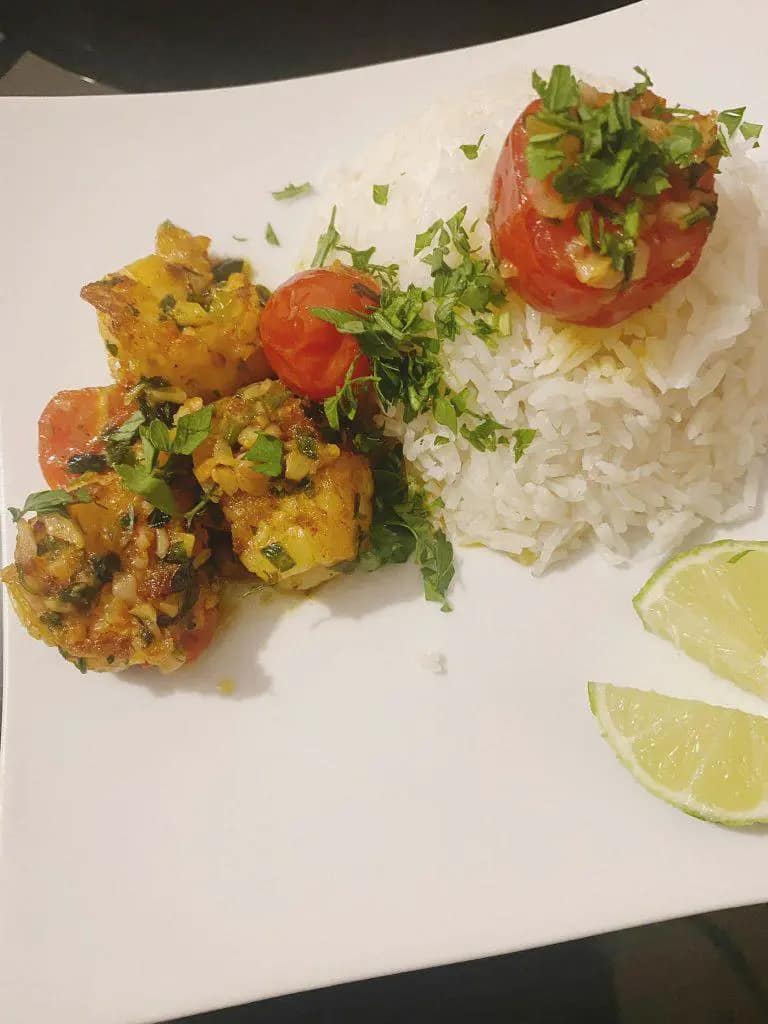 Prawns in garlic tomato sauce garnished with parsley